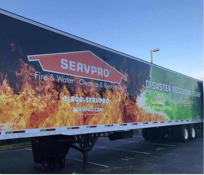 The side of a large SERVPRO truck is shown 